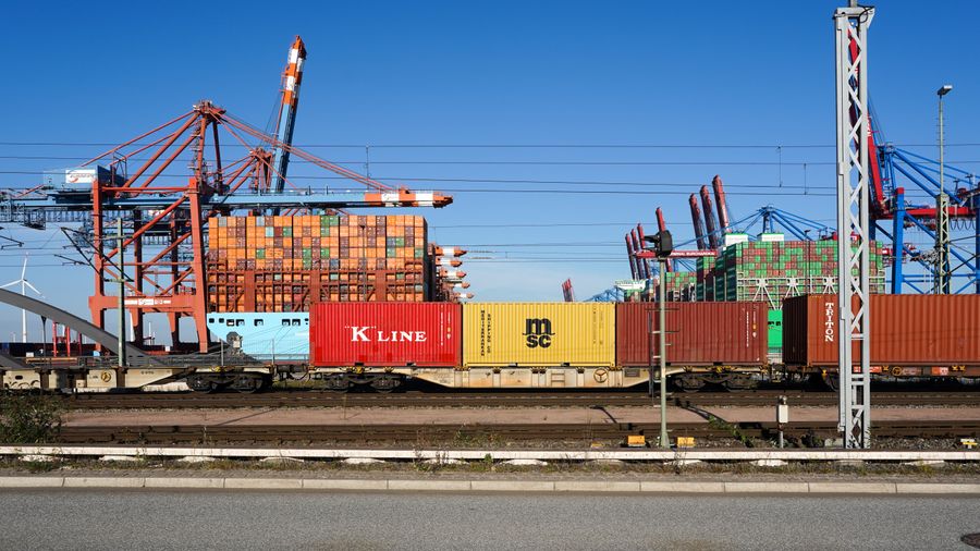 Shipping containers and gantry cranes at a container terminal