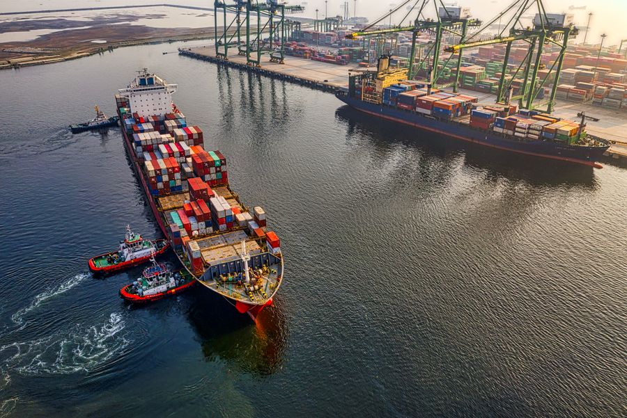 Container ship viewed from above while crossing the ocean