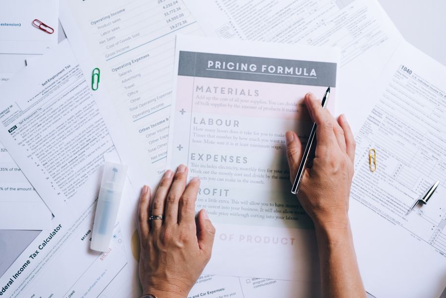 Professional reviewing and signing shipping contract documents